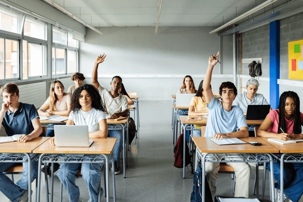 young-students-raising-hands-ask-600nw-2492067905