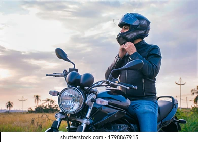 man-sitting-on-motorcycle-wearing-260nw-1798867915